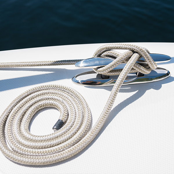 Cleat in use on the deck of a boat