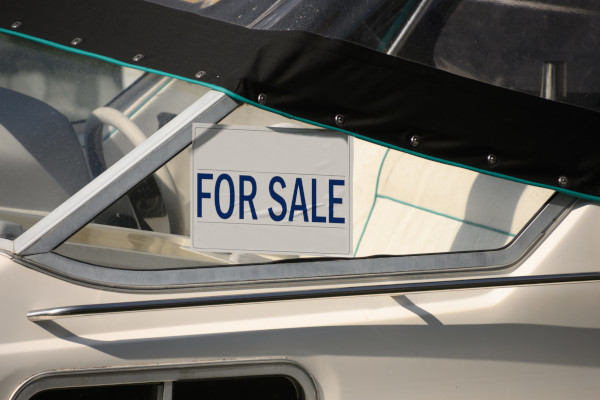 For sale sign on a yacht
