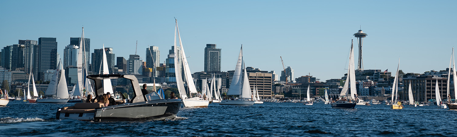 Sail boats with the seattle skyline in view